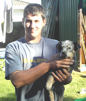 Pup #6 - Ferral with his new person (Bob's) son - Justin - Don't forget to VOTE for ME now!